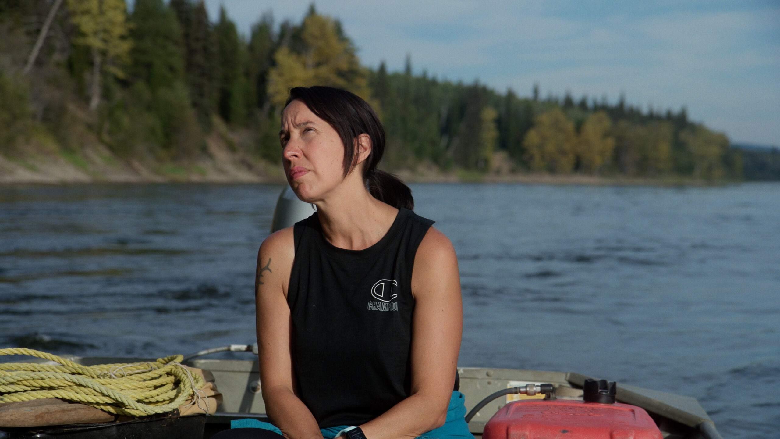 Photo: Lyana in a fishing boat on the Nechako River.