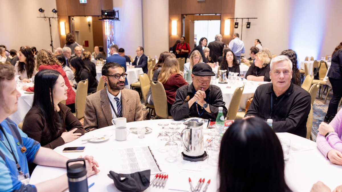 Putting Patients First conference attendees participate in a roundtable discussion activity. 