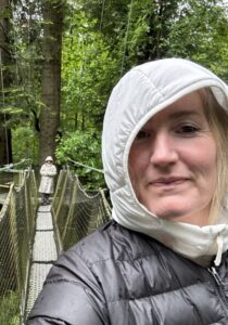 Jennie McCaffrey doesn't let the rain stop her (or her family!) from doing the treetop forest walk at UBC Botanical Gardens.